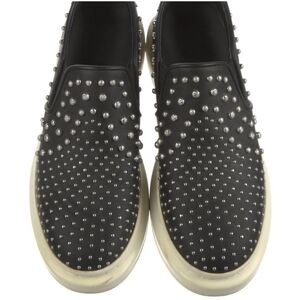 Alexander McQueen Leather Slip-On Sneakers Black Round-Toes with Studs